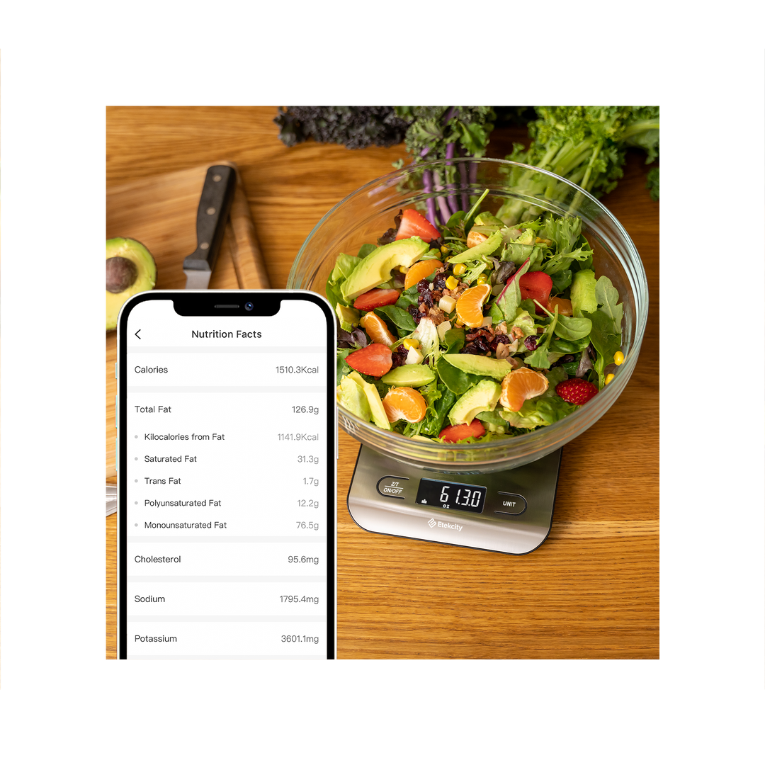 Etekcity Choice Smart Nutrition Scale measuring a salad with nutrition facts on the VeSync app