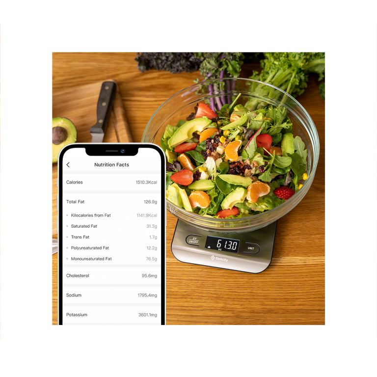Etekcity Choice Smart Nutrition Scale measuring a salad with nutrition facts on the VeSync app