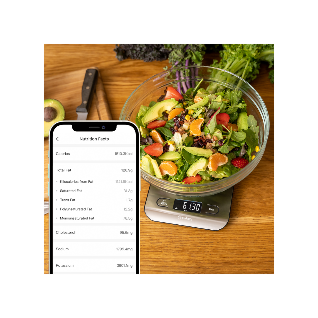 Etekcity Choice Smart Nutrition Scale measuring a salad with nutrition facts on the VeSync app 
