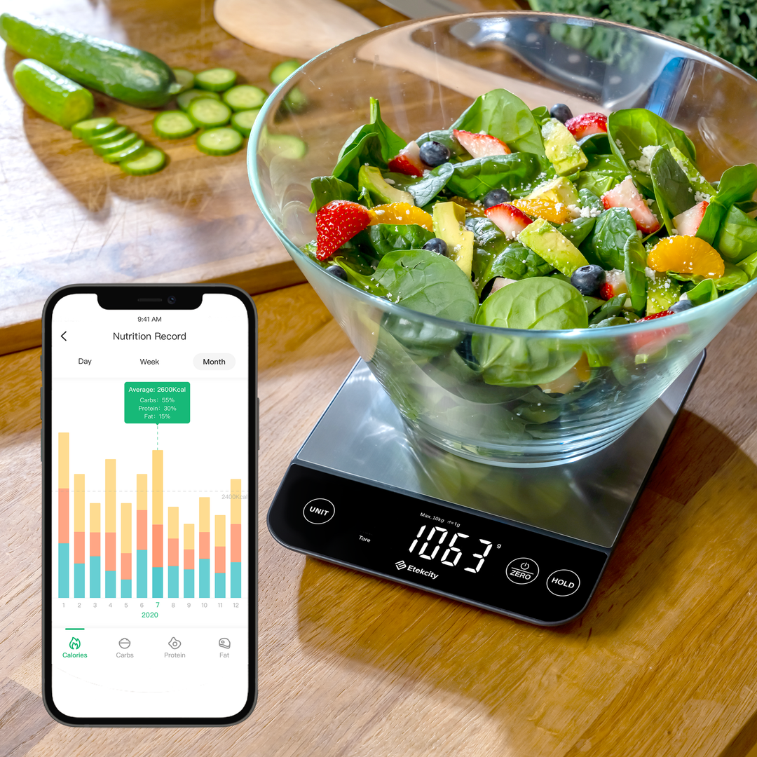 Etekcity Luminary™ Smart Nutrition Scale measuring a salad with nutrition facts on the VeSync app 