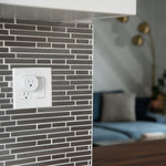 Etekcity Voltson Mini Smart Wi-Fi Outlet Plug plugged into a wall 